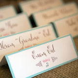 mint and coral escort cards